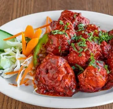 Saucy chicken wings appetizer at Coast West Pizza & Steakhouse in West Edmonton, AB